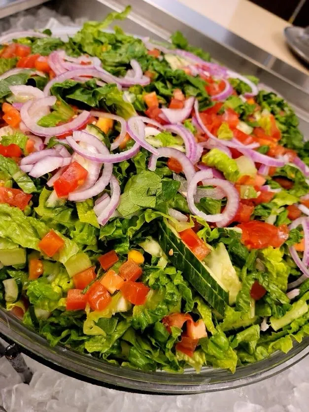 Fresh garden salad platter with tomato and red onion